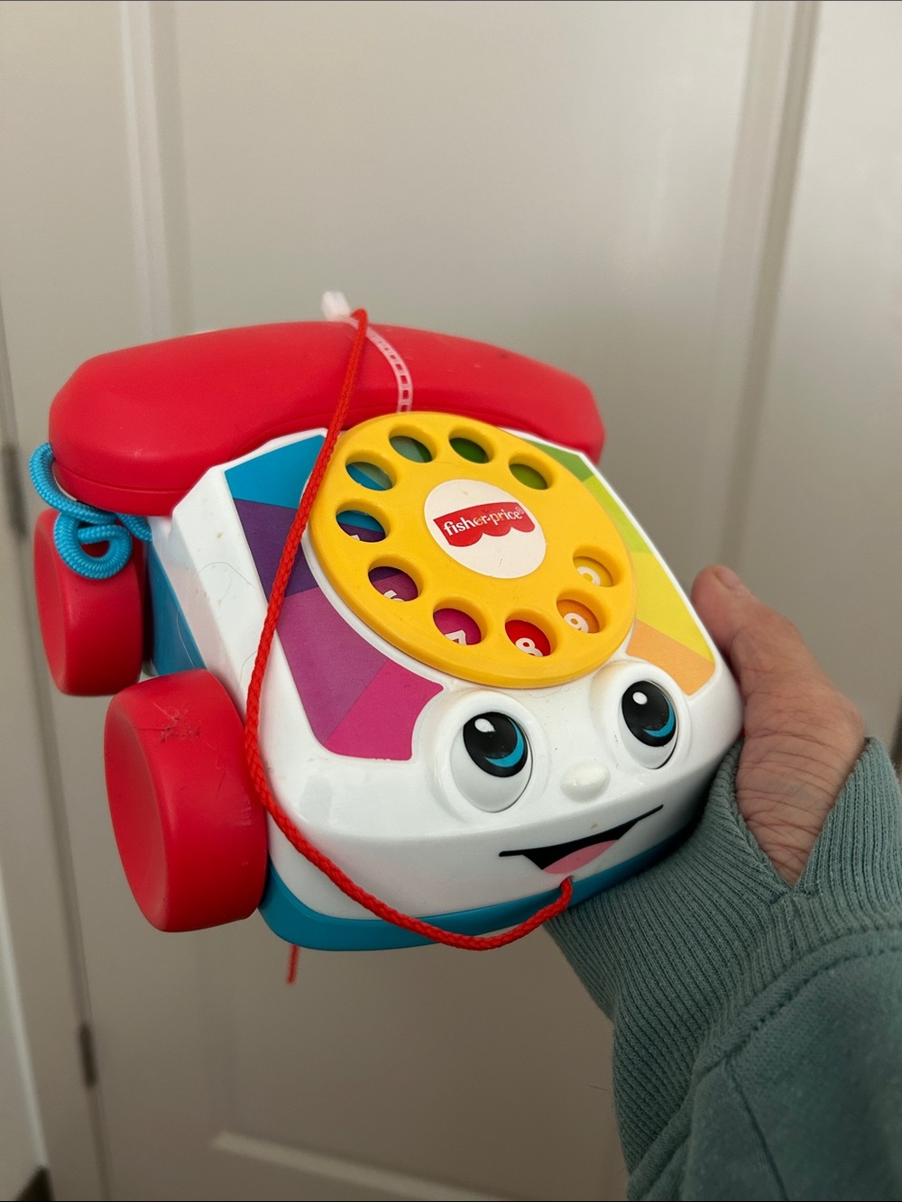 Fisher-Price Bright Red and Yellow Pull-Along Rotary Phone Toy for Toddlers